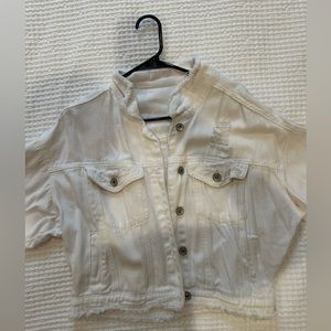Cropped white jean jacket with rips